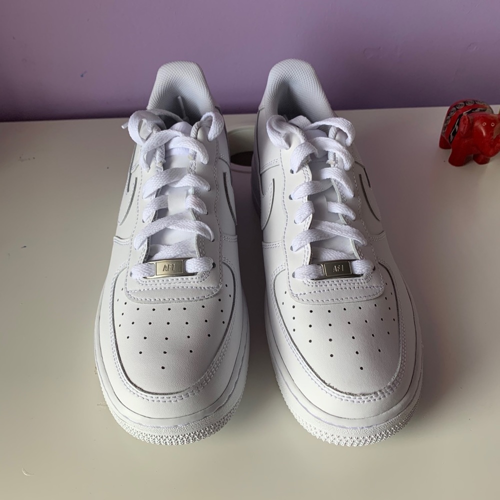 Boys Nike Air Force ones.